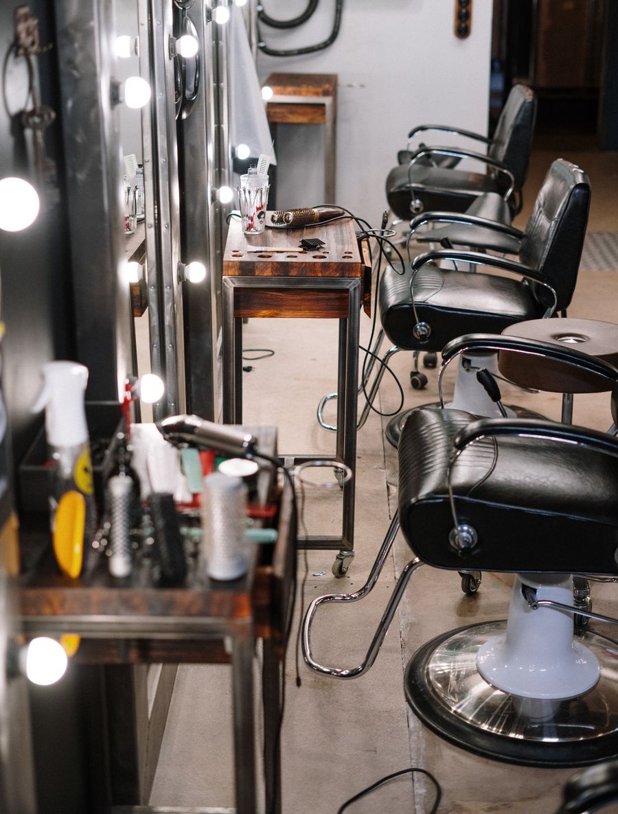 Row of styling chairs at the salon