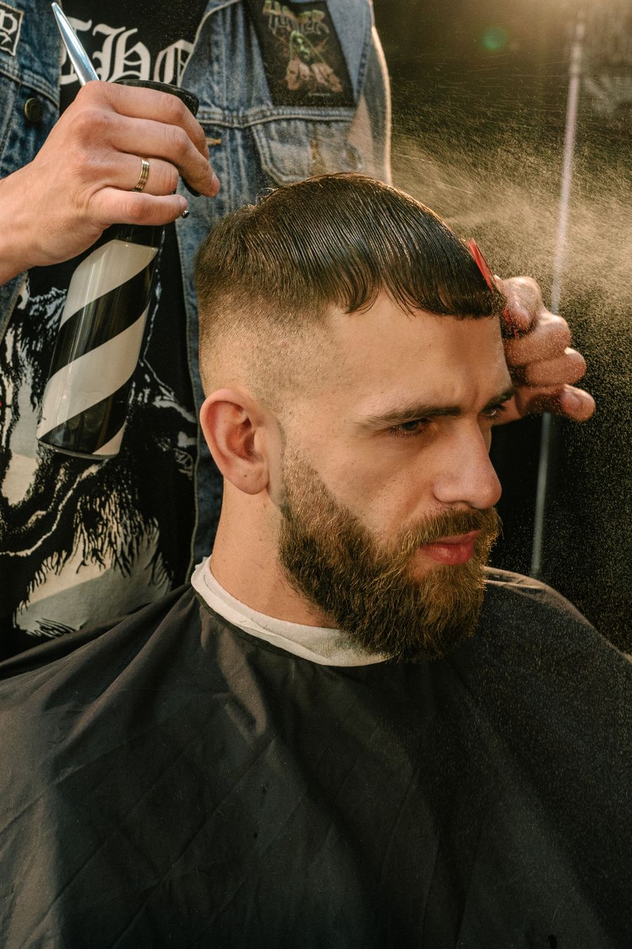 Barber finishing a men's fade